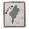 Woven throw blanket with Alta Lake Washington map design and compass rose detail.
