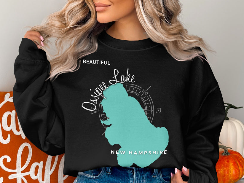 Black sweatshirt featuring a teal map outline of Ossipee Lake, New Hampshire.
