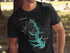 Black t-shirt featuring a teal map of Lake Conroe with compass and "TEXAS" text.