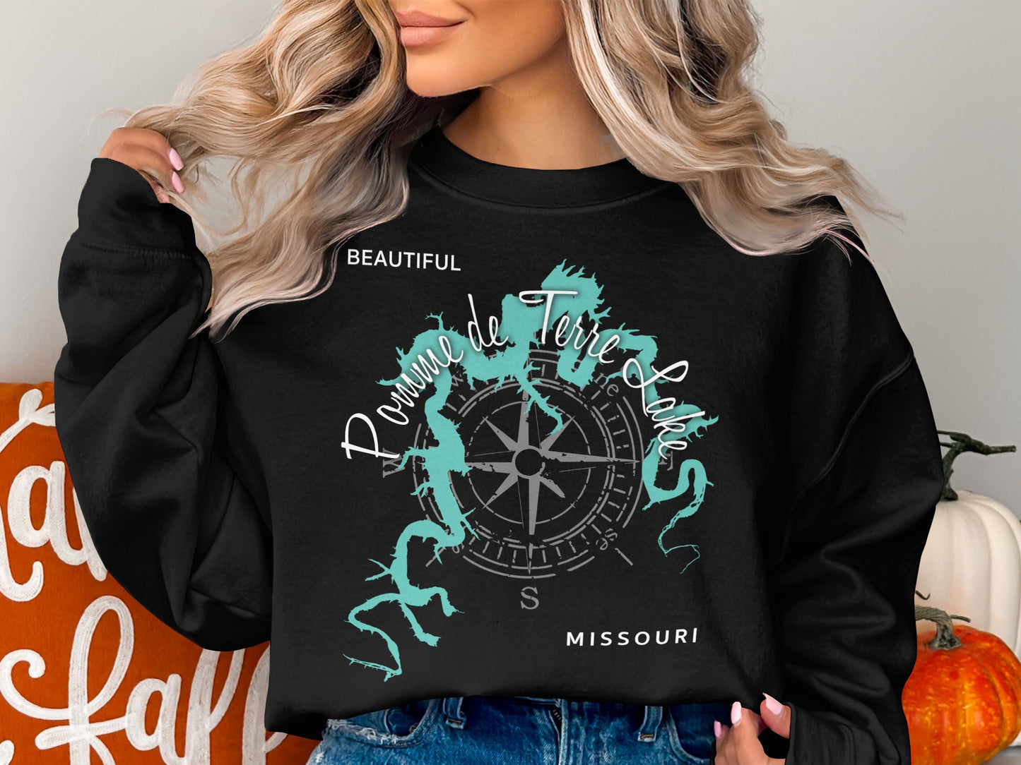 Black sweatshirt with "Pond de Terre Lakes" map and compass design.