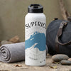 White water bottle with Superior map graphic and compass design.