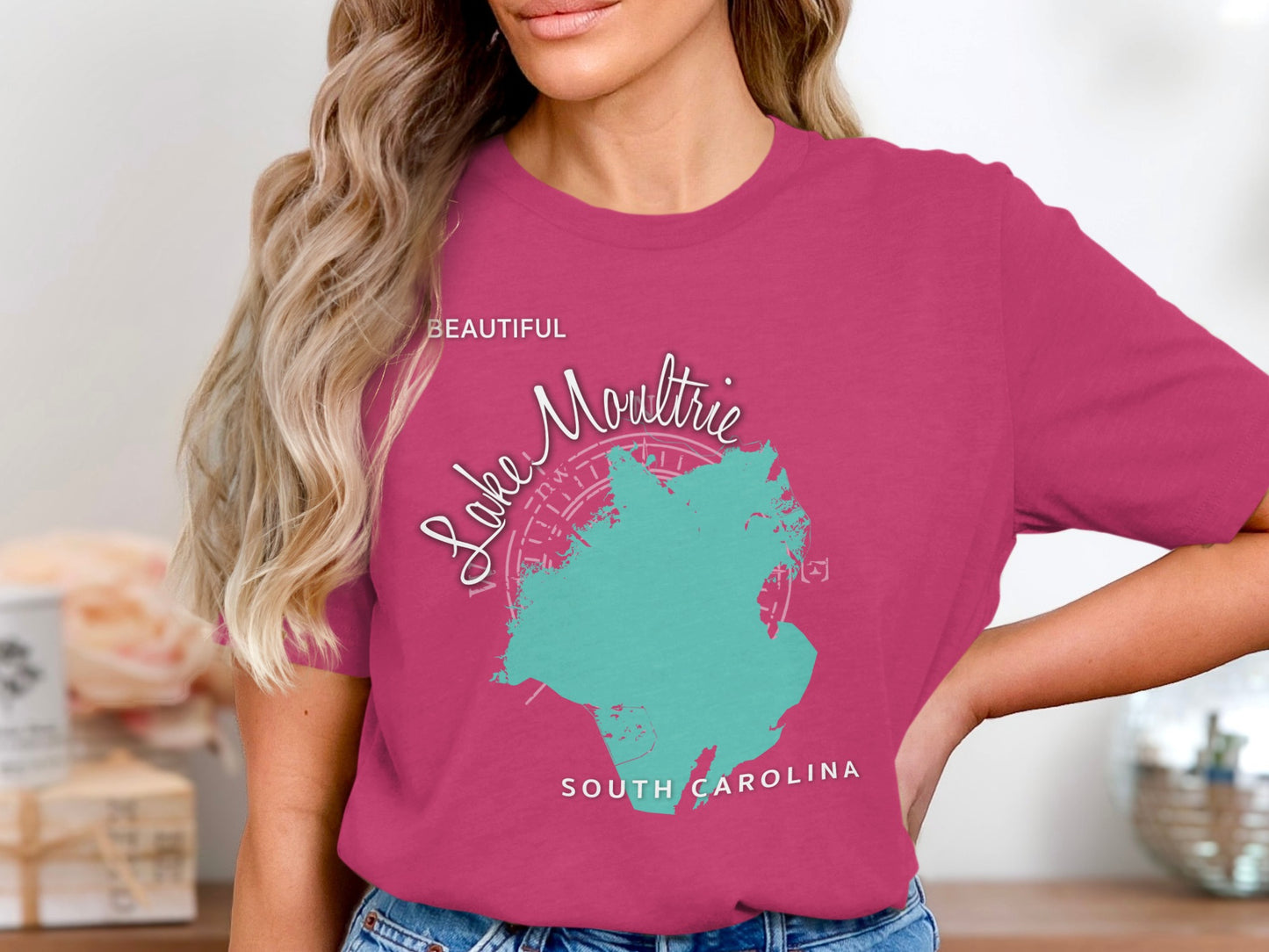 Teal Lake Moultrie map with compass rose on pink t-shirt.