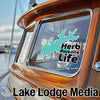 Turquoise outline with text "Herb Parsons Life" on boat window; Lake Lodge Media logo.