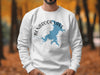 White sweatshirt with Benbrook Lake Texas map and compass graphic.