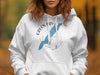 White hoodie with Green Bay Wisconsin map graphic and compass rose.