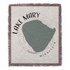 Woven blanket with Lake Mary shape and Minnesota text, compass design.