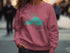 Pink sweatshirt with "Beautiful Lake Superior Ontario" map graphic.