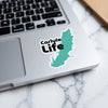 Turquoise Carlyle Lake map sticker with text "Carlyle Life" on a laptop.