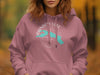 Rose pink hoodie with a compass graphic featuring "Rainbow Lake" and "Maine" text.