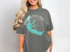 Gray t-shirt with a turquoise Arkabutla Lake outline and compass graphic.