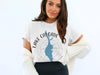 White t-shirt with Lake Cascade Idaho design and compass rose graphic.