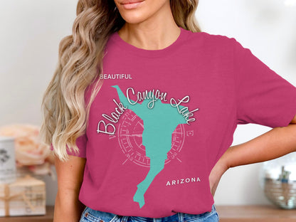 Pink t-shirt with turquoise Black Canyon Lake graphic and compass rose.
