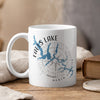 White mug with "Falls Lake North Carolina" map and compass design.