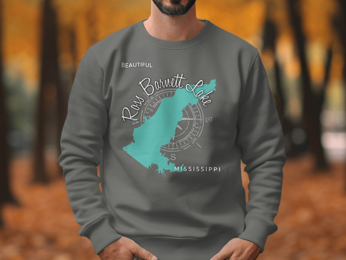 Gray sweatshirt with turquoise Ross Barnett Lake map and compass design.
