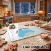 Tempered glass cutting board featuring a map of Lake Manawa, Iowa, on a kitchen counter with gingerbread cookies.