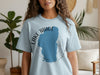 Light blue t-shirt with a blue Lake Tahoe outline and compass rose graphic.