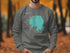 Gray sweatshirt with turquoise Lake Hfiner map outline and "Oklahoma" text.