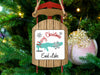 Sled ornament with "Merry Christmas from Enid Lake" text.