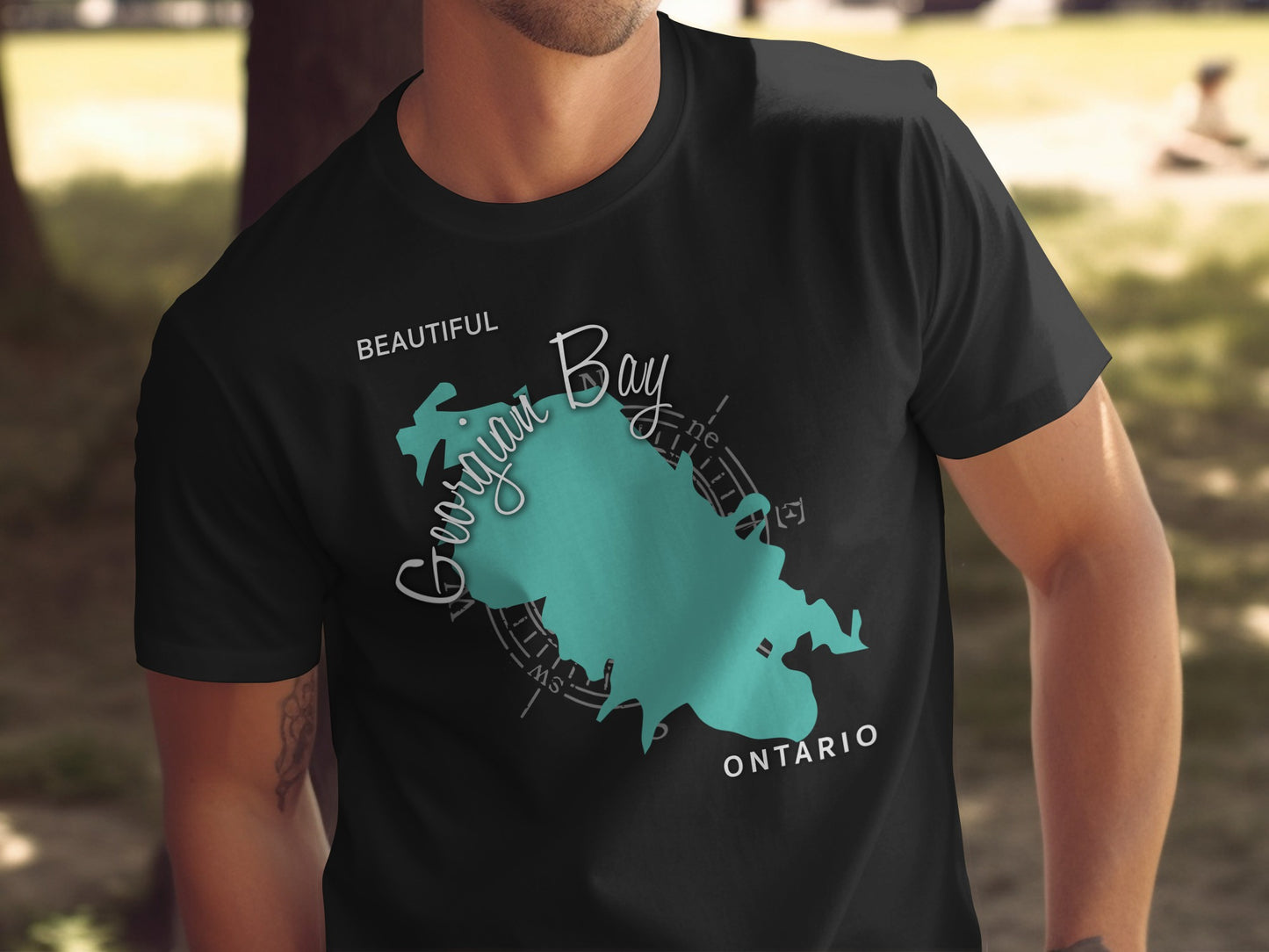 Black t-shirt with Georgian Bay, Ontario map and compass rose design.