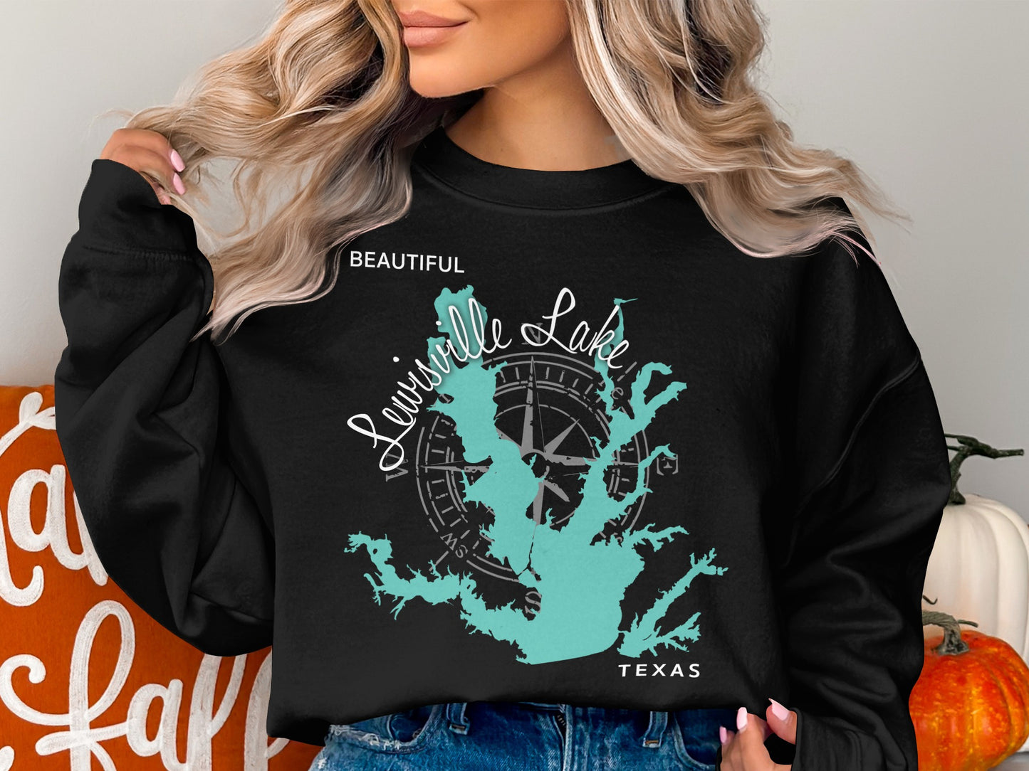 Black sweatshirt with turquoise map of Louisville Lake, Texas and compass rose.