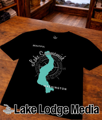Black t-shirt with teal outline of Lake Sammamish and "Lake Lodge Media" logo.