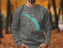 Gray sweatshirt with "Beautiful Eklutna Lake Alaska" text and compass design.