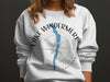 White sweatshirt with blue Lake Windermere map and compass graphic.