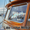 Cumberland Life sticker on a boat window with Lake Lodge Media logo.