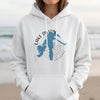 White hoodie featuring "Lake Dillon Colorado" text and a blue compass design.