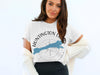 White t-shirt with "Huntington Lake California" and map graphic.