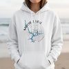 White hoodie with Mitchell Lake Alabama map and compass graphic.