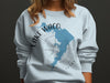 Light blue sweatshirt with Lake Waco map, compass, and Texas text.