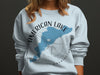 Light blue sweatshirt with American Lake Washington map and compass design.