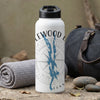 White water bottle with a compass rose and blue map graphic, beside a rolled towel and duffel bag.