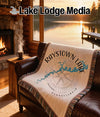 Raystown Lake Pennsylvania blanket on couch with fireplace and lake view.