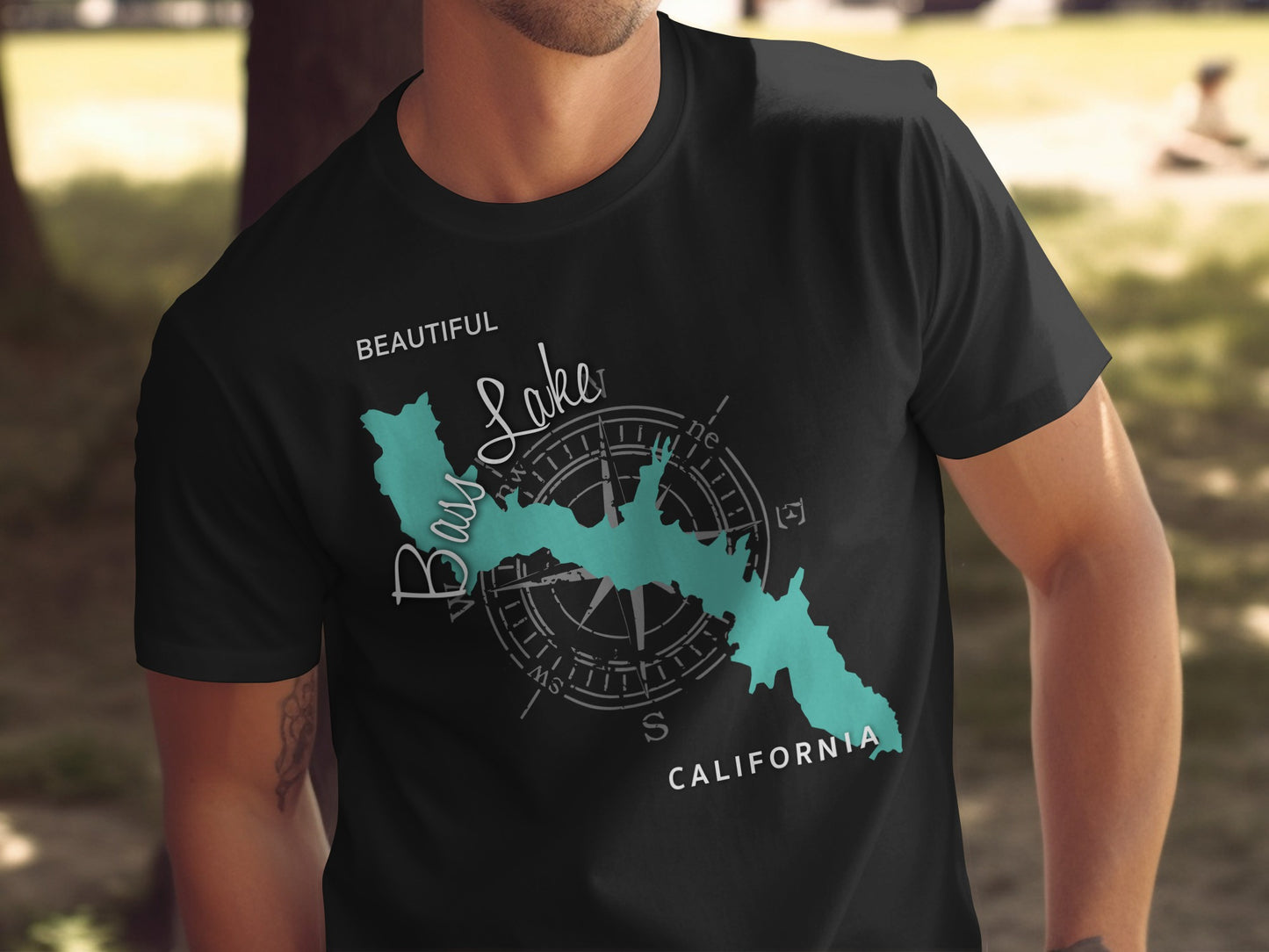 Black t-shirt with "Bass Lake California" and compass graphic.