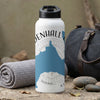 White water bottle with black lid, featuring a blue mountain and compass design.