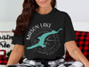 Black t-shirt with a teal Mason Lake Washington map and compass design.