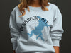 Light blue sweatshirt with Benbrook Lake Texas map and compass design