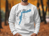 White sweatshirt with Baker Lake, Washington map and compass design.