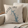 Pillow with Falcon Lake Texas map and compass graphic.