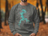Gray sweatshirt with "Beautiful Little Grassy Lake Illinois" map and compass graphic.