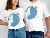 White t-shirts with Newnans Lake Florida graphic and compass design.