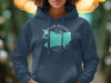 Navy hoodie with a teal Manasquan Reservoir map graphic and text.