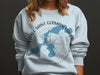 Light blue sweatshirt featuring Little Saint Germain Lake, Wisconsin map and compass graphic.