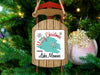 Wooden sled ornament with "Merry Christmas from Lake Monroe" text.