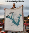 Woven blanket with Lake Fork Texas map, compass rose, and "Lake Lodge Media" text.