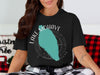 Black t-shirt with "Lake Mohave Arizona" graphic featuring a turquoise lake shape and compass.