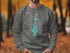 Grey sweatshirt with teal Priest Lake, Idaho map and compass design.