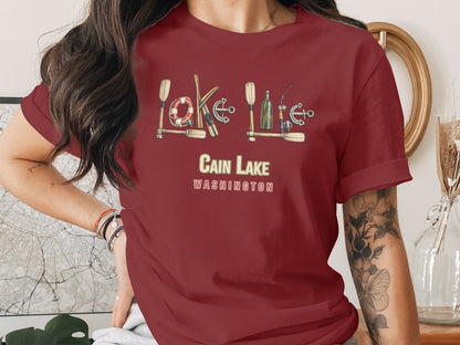 Burgundy t-shirt with "CAIN LAKE WASHINGTON" and nautical graphics.